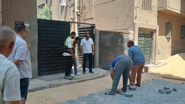 استمرار أعمال تطوير ورفع كفاءة شارع الفتح بالعجوزة