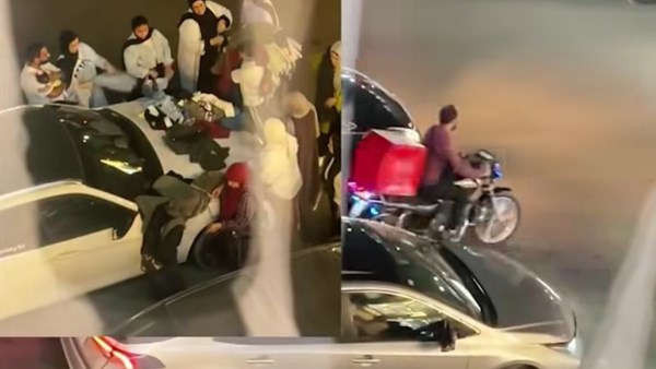 صاحب سيارة يترك بائع ملابس يستغل سيارته حتى يبيع عليها بضاعته