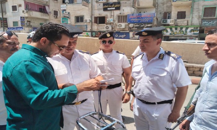حملة مكبرة بنجع حمادي لضبط الشارع ورفع الإشغالات بالتنسيق مع الشرطة