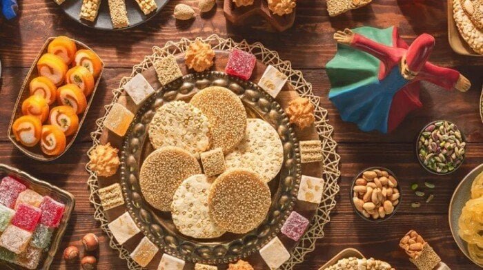 حكم التهادي بحلوى المولد النبوي.. دار الإفتاء توضح
