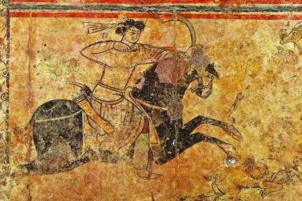 صياد غزلان في لوحة أموية من قصر الحير الغربي