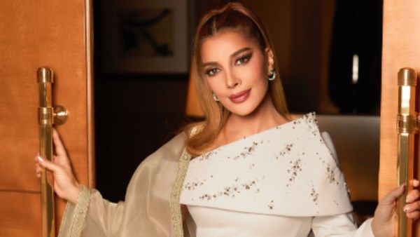 أصالة تستعرض رشاقتها بفستان محتشم.. شاهد