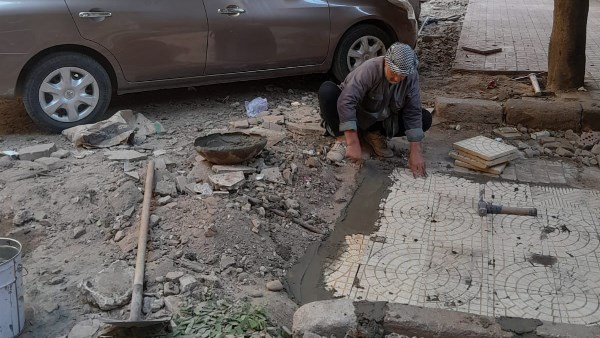 تنفيذ أعمال إعادة الشيء لأصله وتحسين الحالة العامة للشوارع بالعجوزة