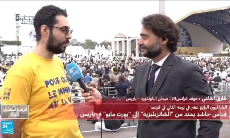 متطوعون يساهمون في تنظيم قداس البابا في باريس